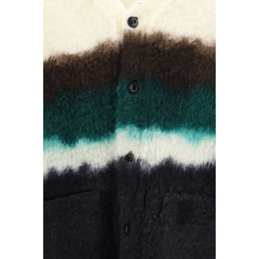 Cardigan by Sacai for men in wool & polyester multicolor features a nuanced silhouette with a refined and nuanced detailing for a sophisticated look.