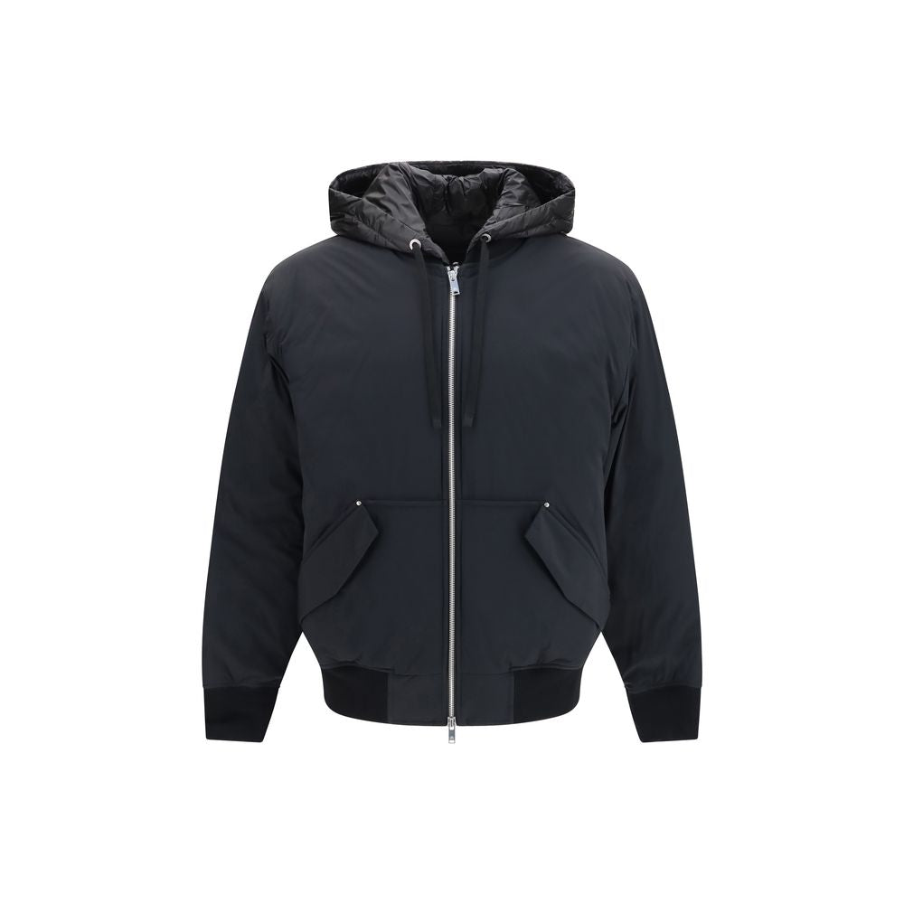 Hooded Puffer Jacket by Moose Knuckles for men in nylon & duck-down black & signature showcases a bohemian silhouette, artfully detailed with a bohemian hooded neckline and signature pockets, hooded & insulated for a truly bohemian finish.