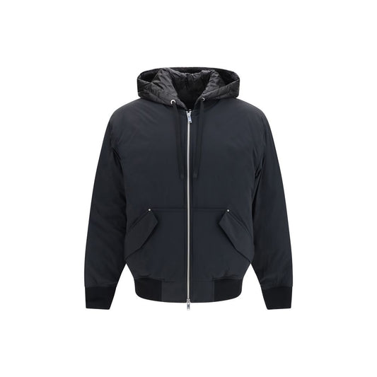 Hooded Puffer Jacket by Moose Knuckles for men in nylon & duck-down black & signature showcases a bohemian silhouette, artfully detailed with a bohemian hooded neckline and signature pockets, hooded & insulated for a truly bohemian finish.