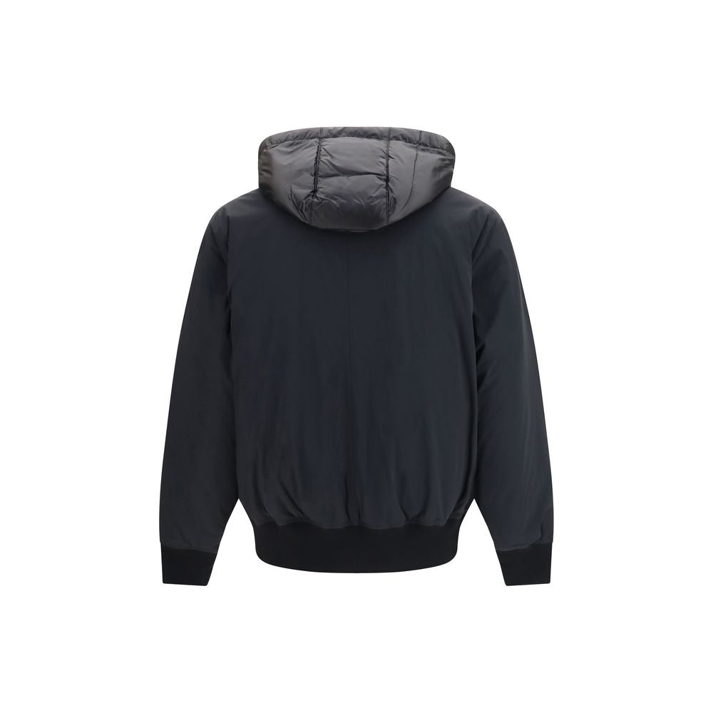 Hooded Puffer Jacket by Moose Knuckles for men in nylon & duck-down black & signature features a dramatic silhouette, showcasing a sophisticated hooded neckline and distinctive pockets, hooded & insulated for a dramatic aesthetic.