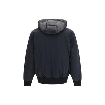 Hooded Puffer Jacket by Moose Knuckles for men in nylon & duck-down black & signature features a dramatic silhouette, showcasing a sophisticated hooded neckline and distinctive pockets, hooded & insulated for a dramatic aesthetic.