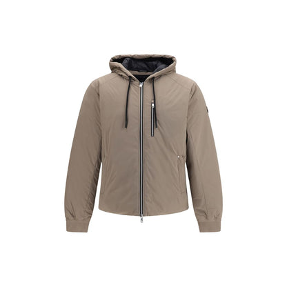 Hooded Puffer Jacket by Moose Knuckles for men in nylon & duck-down beige & signature presents a effortlessly chic silhouette, showcasing a sophisticated hooded neckline and premium pockets, hooded & insulated for a truly effortlessly chic finish.