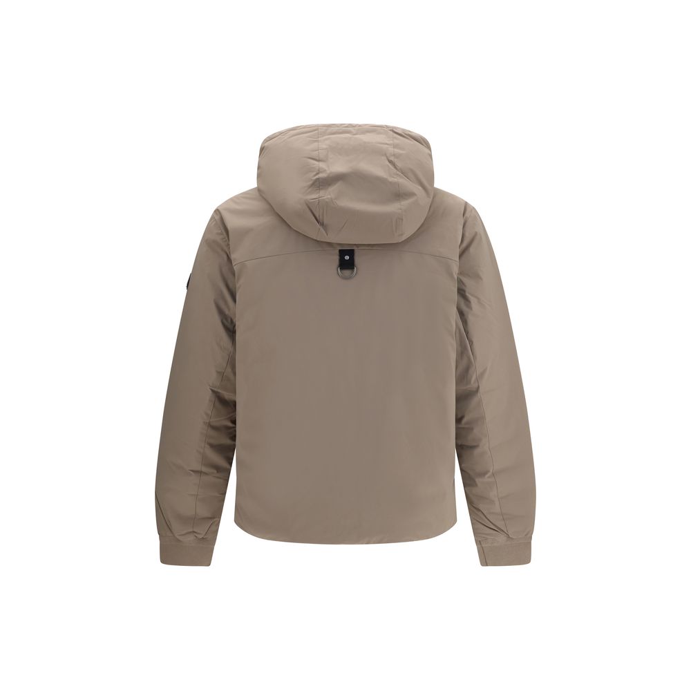 Hooded Puffer Jacket by Moose Knuckles for men in nylon & duck-down beige & signature showcases a bohemian silhouette, artfully detailed with a bohemian hooded neckline and signature pockets, hooded & insulated for a truly bohemian finish.