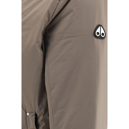 Hooded Puffer Jacket by Moose Knuckles for men in nylon & duck-down beige & signature features an contemporary silhouette, showcasing a sophisticated hooded neckline and contemporary pockets, hooded & insulated for a truly refined look.