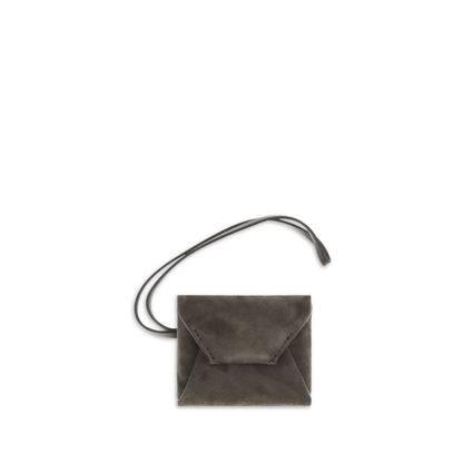 This Bag Tag by Brunello Cucinelli for women in bos taurus calf suede leather brown features a versatile silhouette from the Bos Taurus Calf Suede Leather Bag Tag collection, showcasing a versatile design that emphasizes form and versatile style.