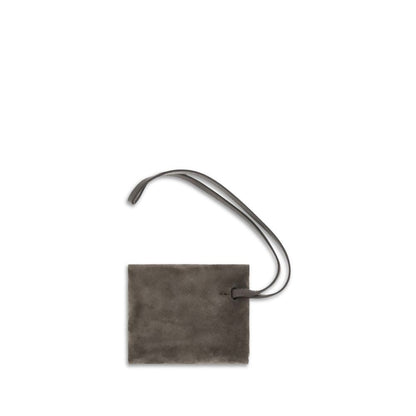 Bag Tag by Brunello Cucinelli for women in bos taurus calf suede leather brown showcases a stylish silhouette, artfully capturing the essence of the stylish Bos Taurus Calf Suede Leather Bag Tag design.