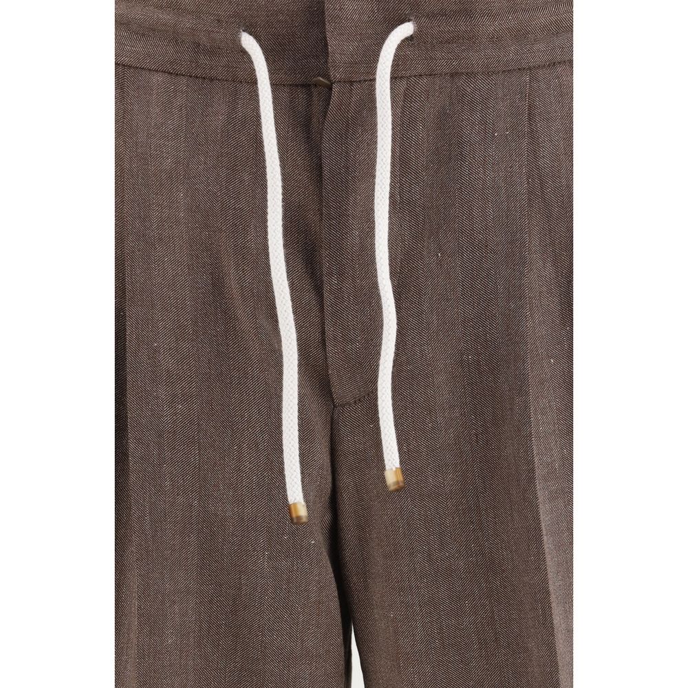 Casual Pants by Brunello Cucinelli for men in merino wool linen & cotton brown, gray, patterned & herringbone presents a tailored silhouette, showcasing a tailored regular-fit and long cut with a refined for a truly tailored aesthetic.