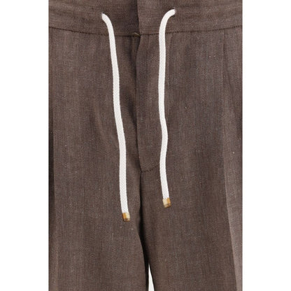 Casual Pants by Brunello Cucinelli for men in merino wool linen & cotton brown, gray, patterned & herringbone presents a tailored silhouette, showcasing a tailored regular-fit and long cut with a refined for a truly tailored aesthetic.