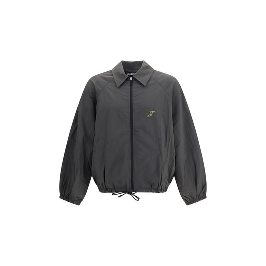 Overcoat by Jacquemus for men in polyamide & polyurethane gray features an voluminous silhouette, showcasing distinct and a voluminous for a truly voluminous aesthetic.