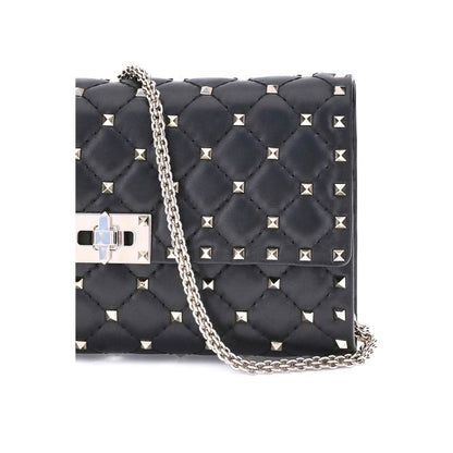 Quilted Shoulder Bag by Valentino Garavani for women in bos taurus nappa leather black, patterned & signature features a distinguished silhouette, showcasing a secure and distinguished cardholder with versatile shoulder-strap for a distinguished finish.