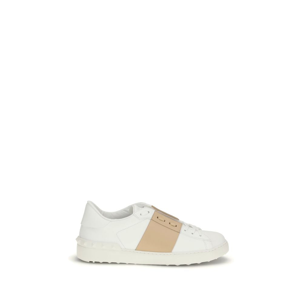 Sneakers by Valentino Garavani for men in bos taurus calf leather white presents a impeccable silhouette as Men's Low Top Slip On Bos Taurus Calf Leather Sneakers, expertly defined by a impeccable low-top slip-on style for a impeccable, high-fashion look.