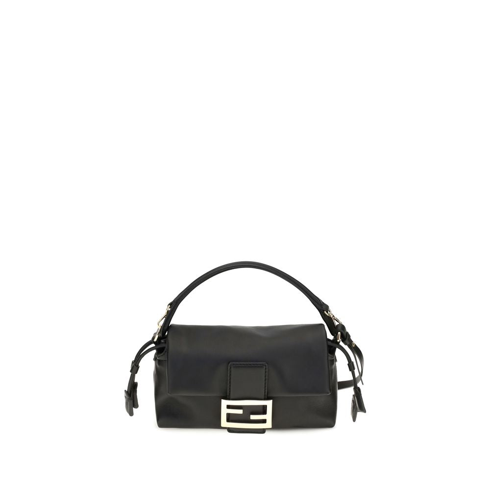 Shoulder Drawstring Baguette Bag by Fendi for women in nappa leather black & gold showcases a enviable silhouette, artfully detailed with a secure flap, drawstring, magnetic & button, organized , and versatile shoulder-strap & handle for a enviable look.