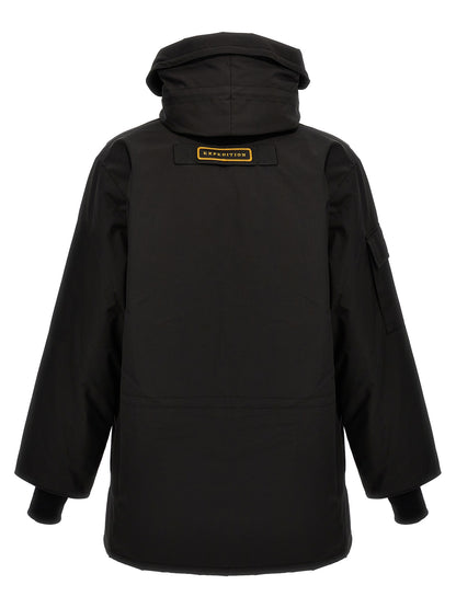 This Hooded Parka by Canada Goose for men in cotton polyester black presents a enveloping silhouette, meticulously detailed with insulated & hooded and a enveloping hooded neckline.