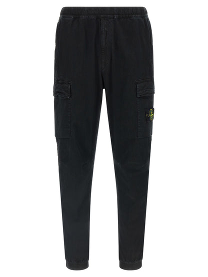 Cargo Pants by Stone Island for men in stretch cotton twill black & signature features an tailored tapered-leg with a and long, creating a tailored utilitarian silhouette.