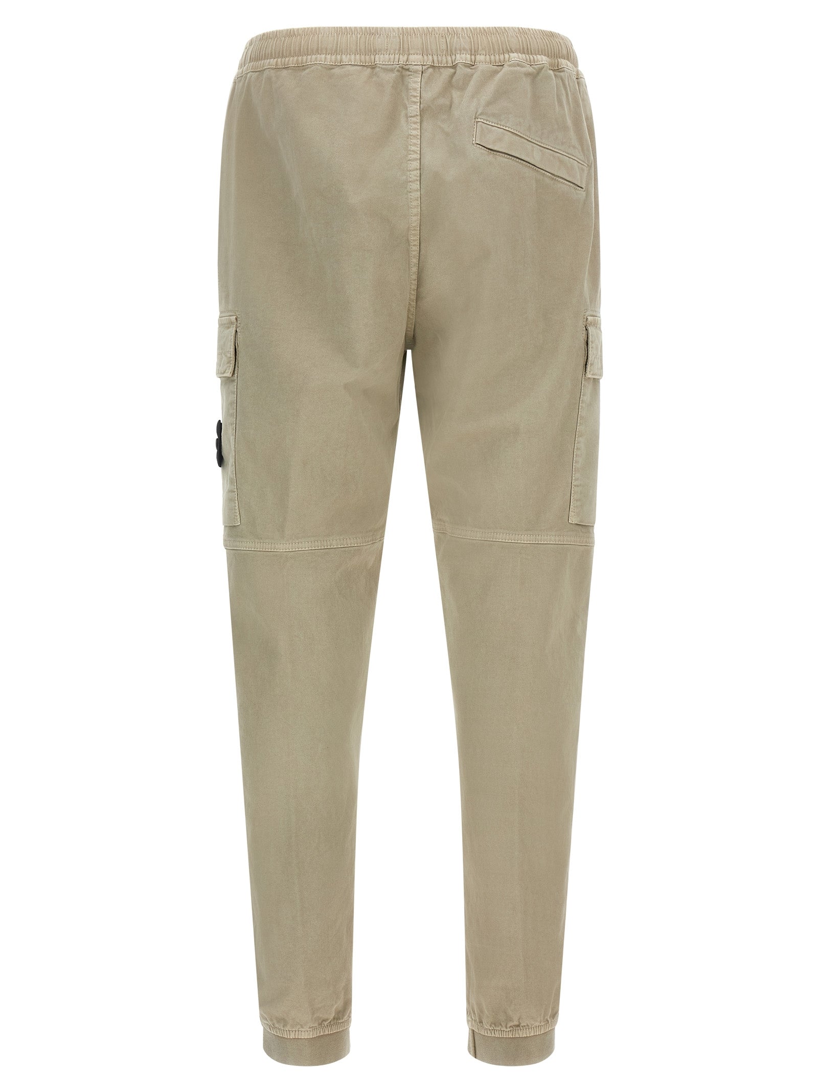 Cargo Pants by Stone Island for men in stretch cotton twill beige presents a on trend silhouette, artfully finished with a on trend tapered-leg, long, and for a sophisticated look.