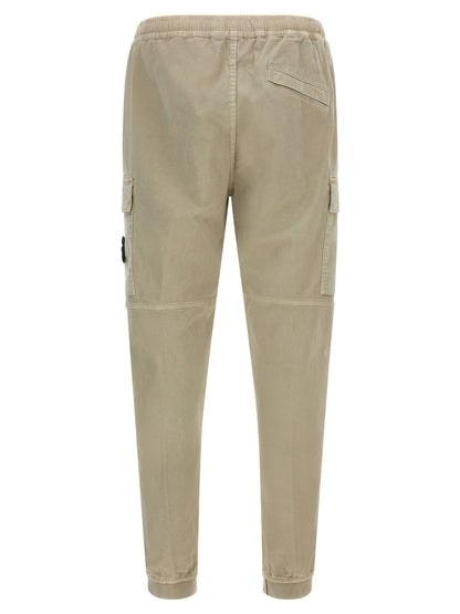 Cargo Pants by Stone Island for men in stretch cotton twill beige presents a on trend silhouette, artfully finished with a on trend tapered-leg, long, and for a sophisticated look.