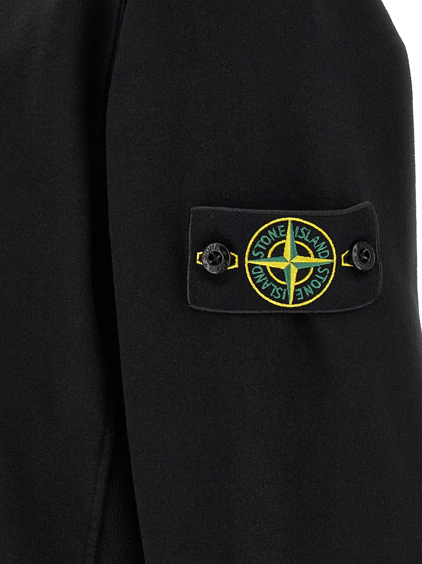 Sweatshirt by Stone Island for men in stretch cotton black showcases a slouchy chic silhouette, artfully detailed with a slouchy chic and for a slouchy chic finish.