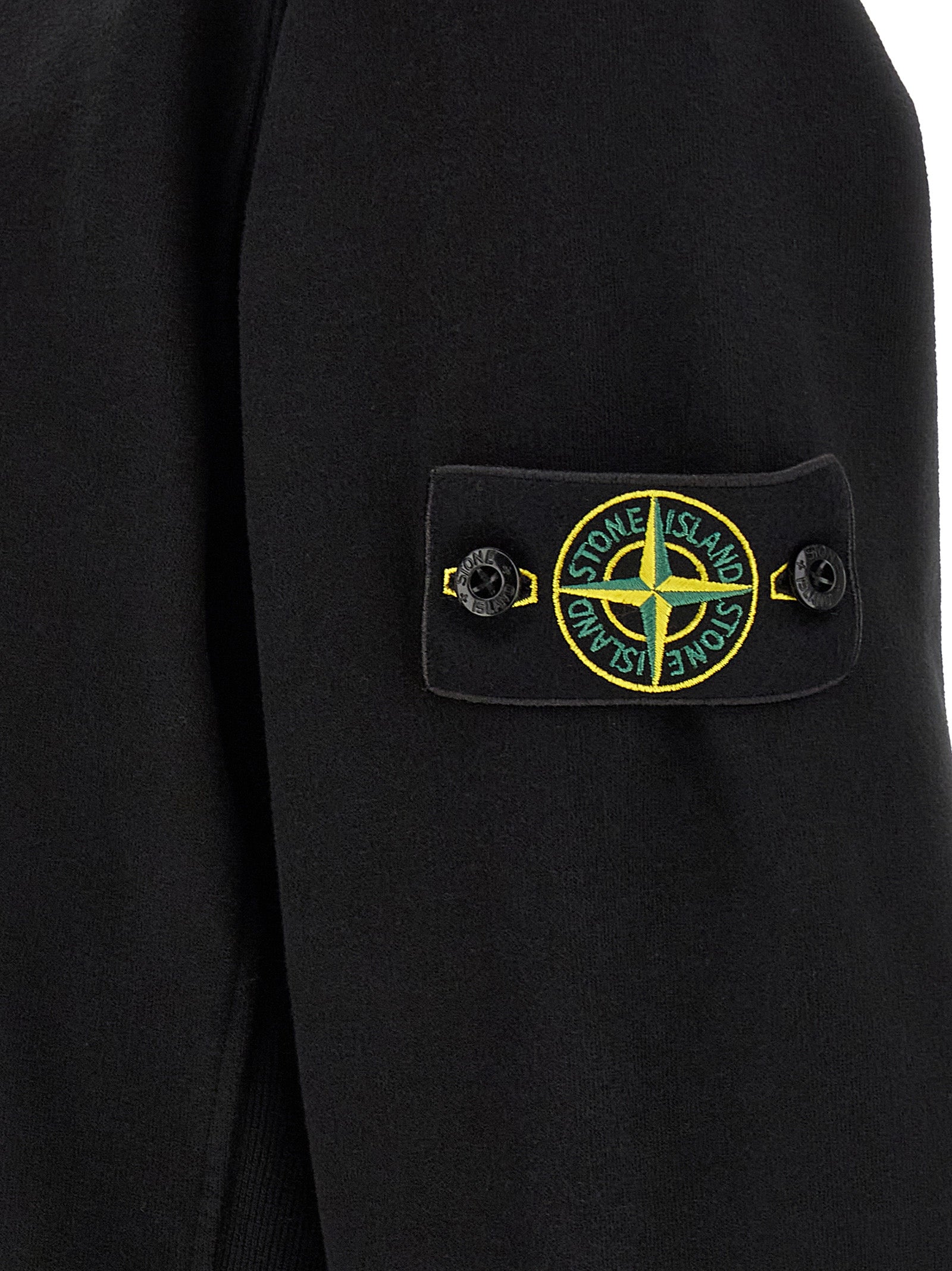 Sweatshirt by Stone Island for men in stretch cotton black showcases a slouchy chic silhouette, artfully detailed with a slouchy chic and for a slouchy chic finish.
