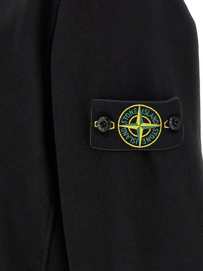 Sweatshirt by Stone Island for men in stretch cotton black showcases a slouchy chic silhouette, artfully detailed with a slouchy chic and for a slouchy chic finish.