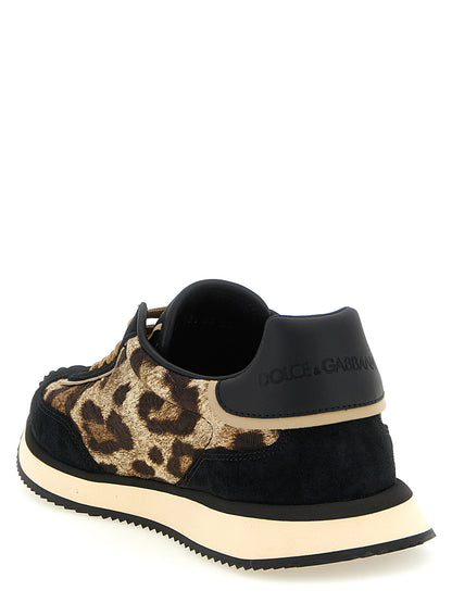 Sneakers by Dolce & Gabbana for women in cotton silk viscose & suede leather black, gold, multicolor & print presents a sumptuous silhouette, artfully capturing the essence of the Women's Low Top Cotton Silk Viscose & Suede Leather Sneakers with its sumptuous low-top style design.