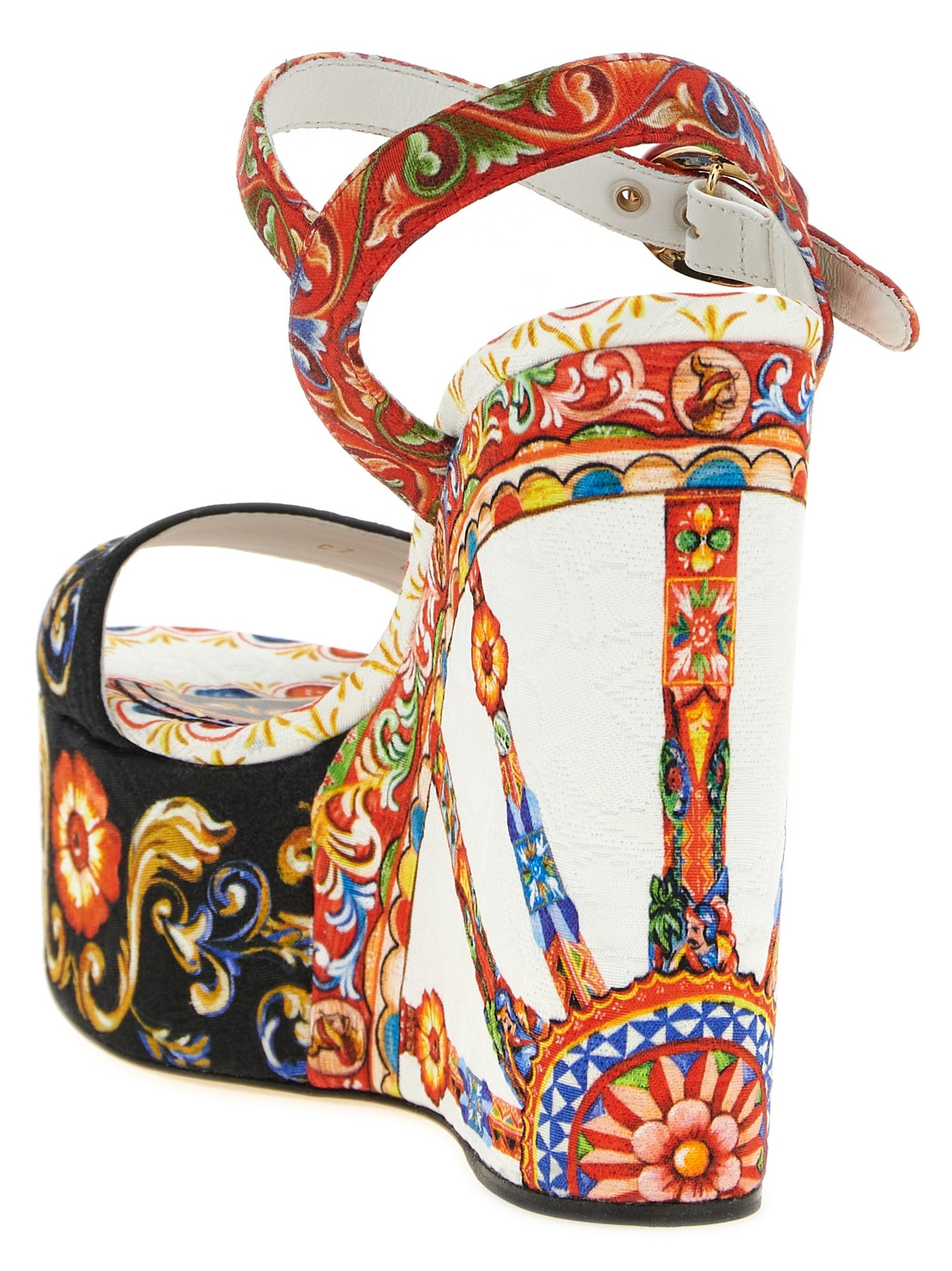 Wedge Ankle Strap Sandals by Dolce & Gabbana for women in cotton viscose & leather and multicolor & print presents a captivating silhouette, showcasing the signature style of the Maiolica Women's Cotton Viscose & Leather Wedge Ankle Strap Sandals with a captivating wedge and captivating .