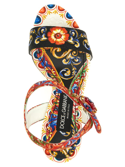 Wedge Ankle Strap Sandals by Dolce & Gabbana for women in cotton viscose & leather multicolor & print showcases a sculptural silhouette as Maiolica Women's Cotton Viscose & Leather Wedge Ankle Strap Sandals, defined by a sculptural wedge and sculptural for a sculptural look.