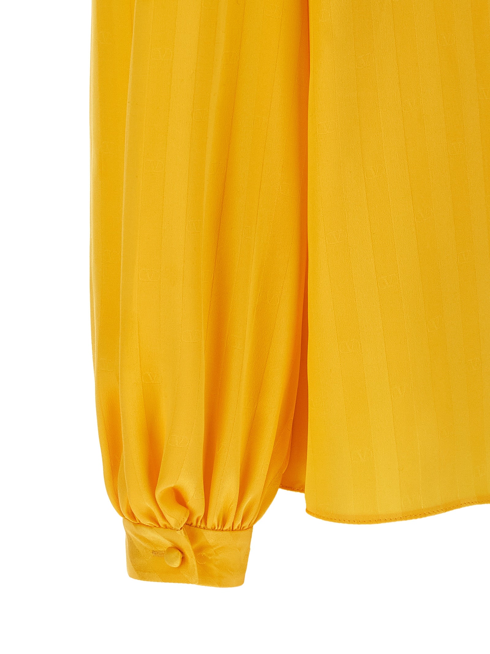 Blouse by Valentino Garavani for women in silk bicolour, yellow, jacquard & striped showcases a sleek silhouette, elegantly detailed with a sleek and for a sleek finish.