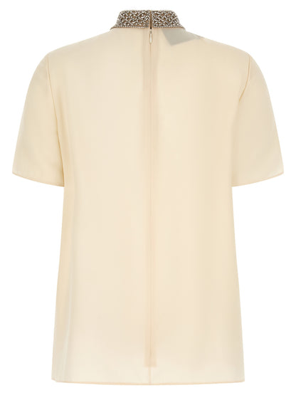 Tank Top by Valentino Garavani for women in silk mesh & crystal white features an bespeak silhouette, showcasing an bespeak and bespeak high-collar neckline for a truly sophisticated look.
