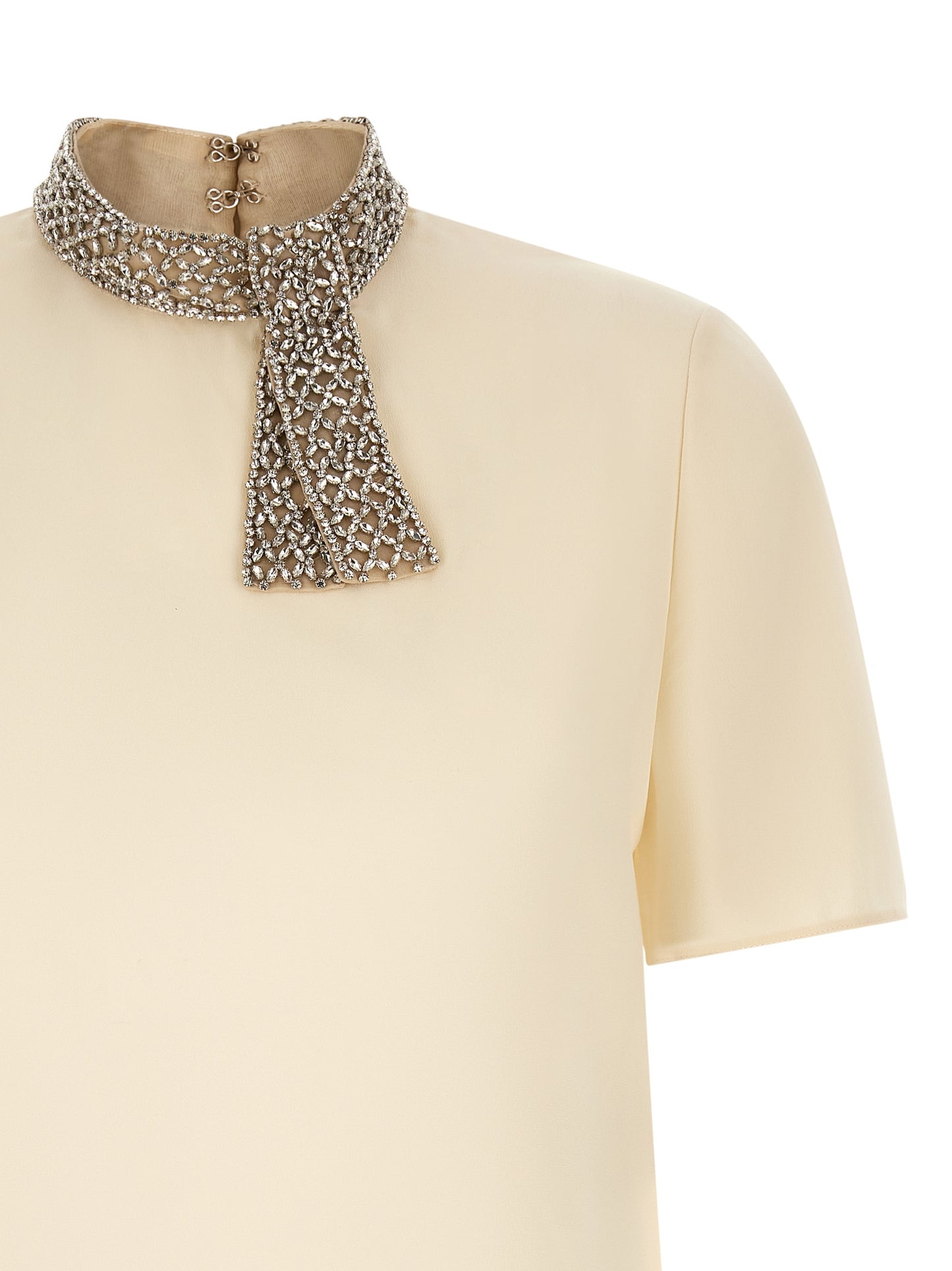 Tank Top by Valentino Garavani for women in silk mesh & crystal white showcases a sumptuous silhouette, artfully detailed with a sumptuous high-collar neckline and for a truly sumptuous finish.