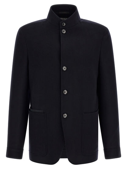 Overcoat by ZEGNA for men in cashmere & leather blue features an voluminous silhouette, showcasing distinct pockets and a voluminous high-collar neckline for a truly voluminous aesthetic.