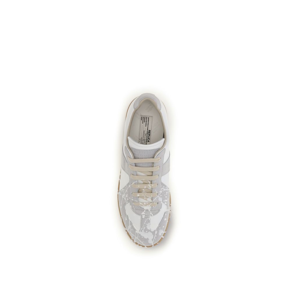 Sneakers by Maison Margiela for men in bos taurus calf suede leather gray & signature features an fashionable silhouette, showcasing the premium Men's Low Top Bos Taurus Calf Suede Leather Sneakers in a fashionable low-top style that offers a fashionable finish for refined style.