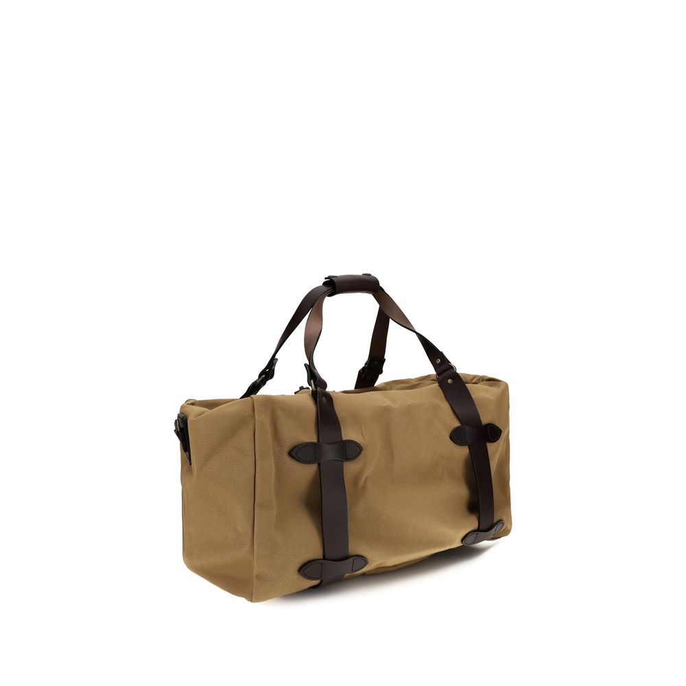 Medium Shoulder Tote Bag by Filson for men in cotton twill beige presents a versatile silhouette, showcasing a secure snap & zipper and versatile internal-pockets with versatile shoulder-strap, adjustable-strap & handle for a sophisticated look.