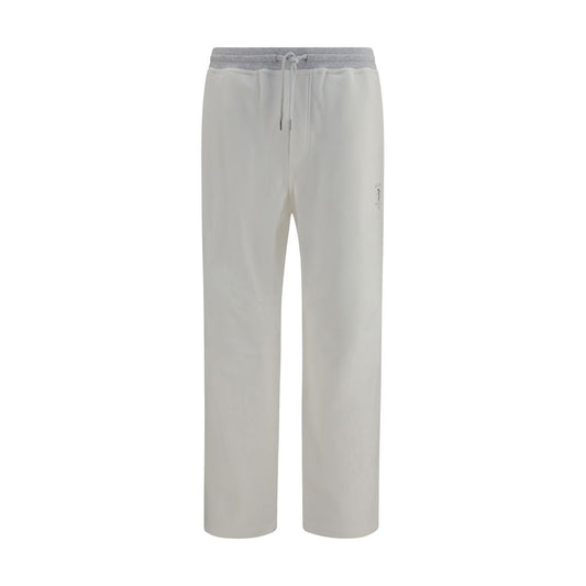 Casual Pants by Brunello Cucinelli for men in stretch cotton white features a polished silhouette with a polished regular-fit, reaching a polished long and finished with a polished .
