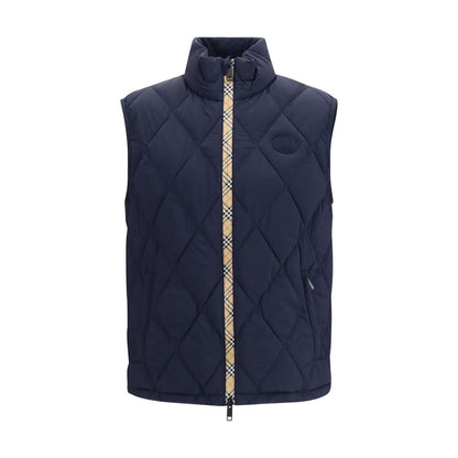 Vest by Burberry for men in polyamide & polyester blue showcases a dynamic silhouette, perfectly balancing pockets & insulated with a dynamic stand-collar neckline for a sophisticated, high-fashion look.