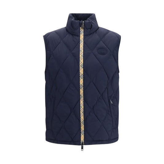 Vest by Burberry for men in polyamide & polyester blue showcases a dynamic silhouette, perfectly balancing pockets & insulated with a dynamic stand-collar neckline for a sophisticated, high-fashion look.