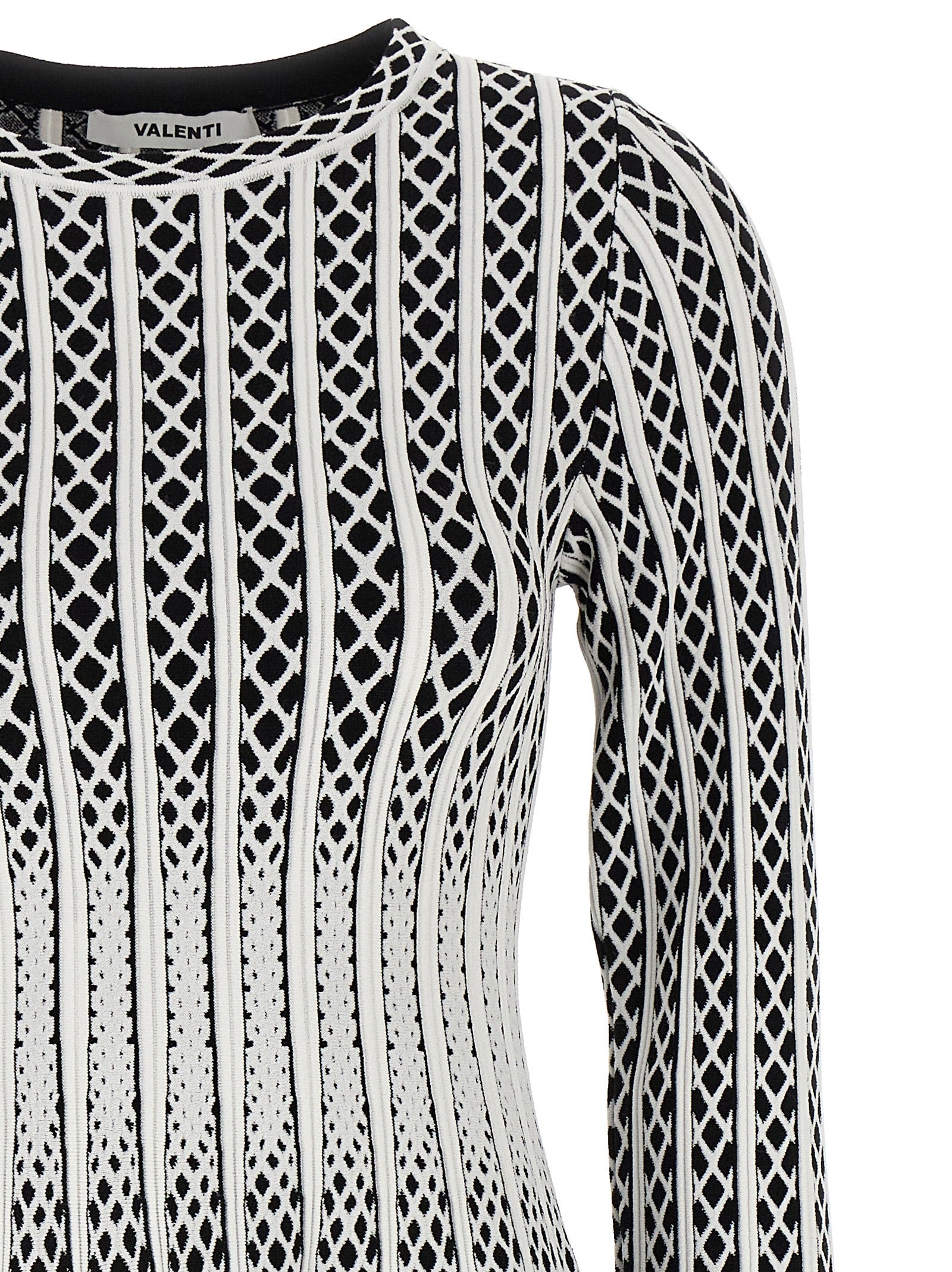 Skirt by ANTONINO VALENTI for women in polyester & viscose bicolour, black, white & patterned features a contoured silhouette from the Women's Polyester & Viscose Midi Skirt collection, characterized by its contoured midi for a contoured finish.