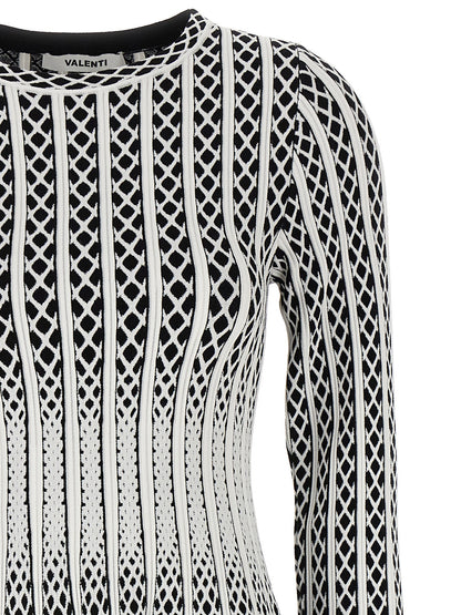 Skirt by ANTONINO VALENTI for women in polyester & viscose bicolour, black, white & patterned features a contoured silhouette from the Women's Polyester & Viscose Midi Skirt collection, characterized by its contoured midi for a contoured finish.