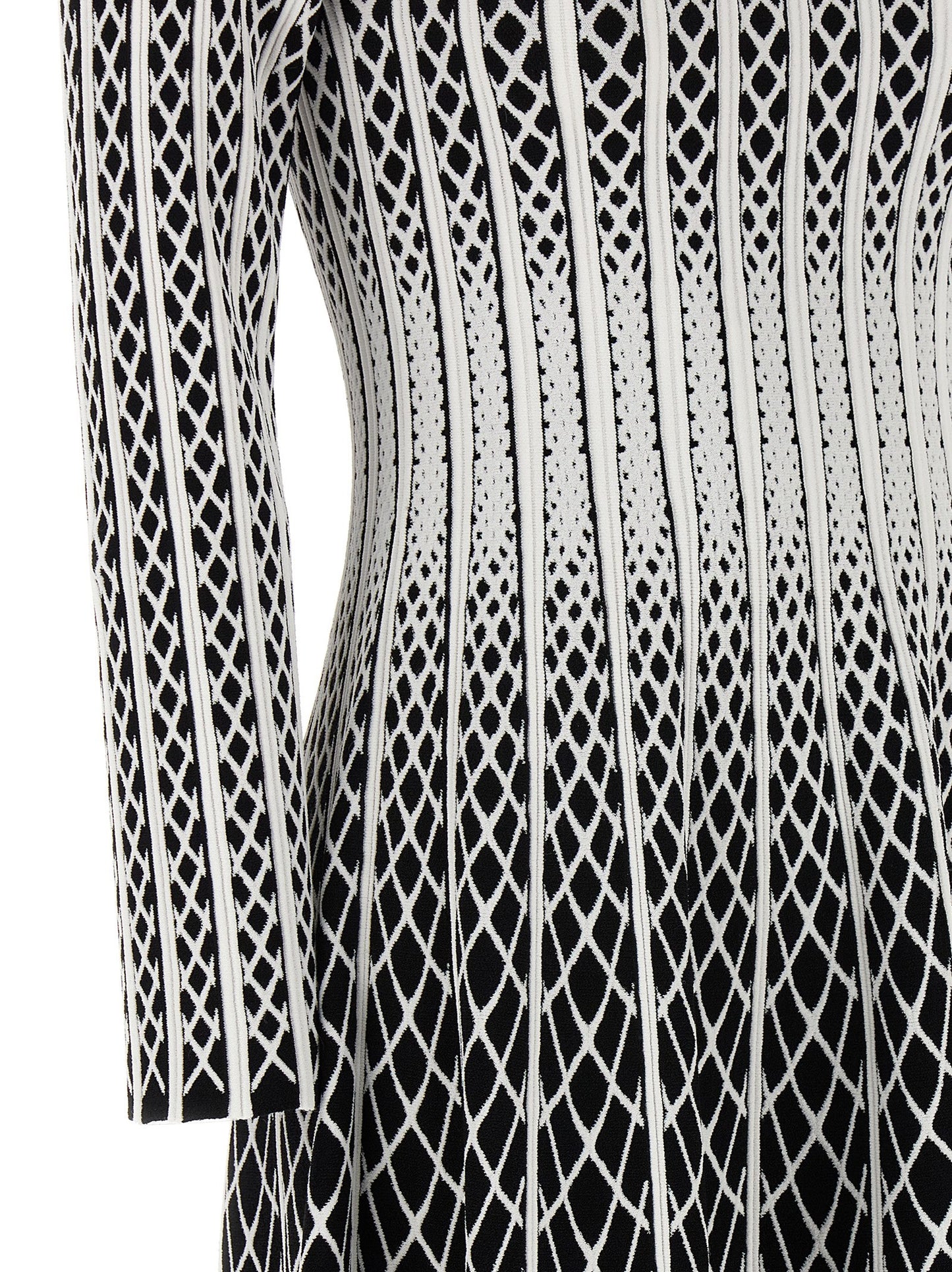 Skirt by ANTONINO VALENTI for women in polyester & viscose bicolour, black, white & patterned features a captivating silhouette, showcasing the captivating Women's Polyester & Viscose Midi Skirt design with a sophisticated midi for a captivating look.