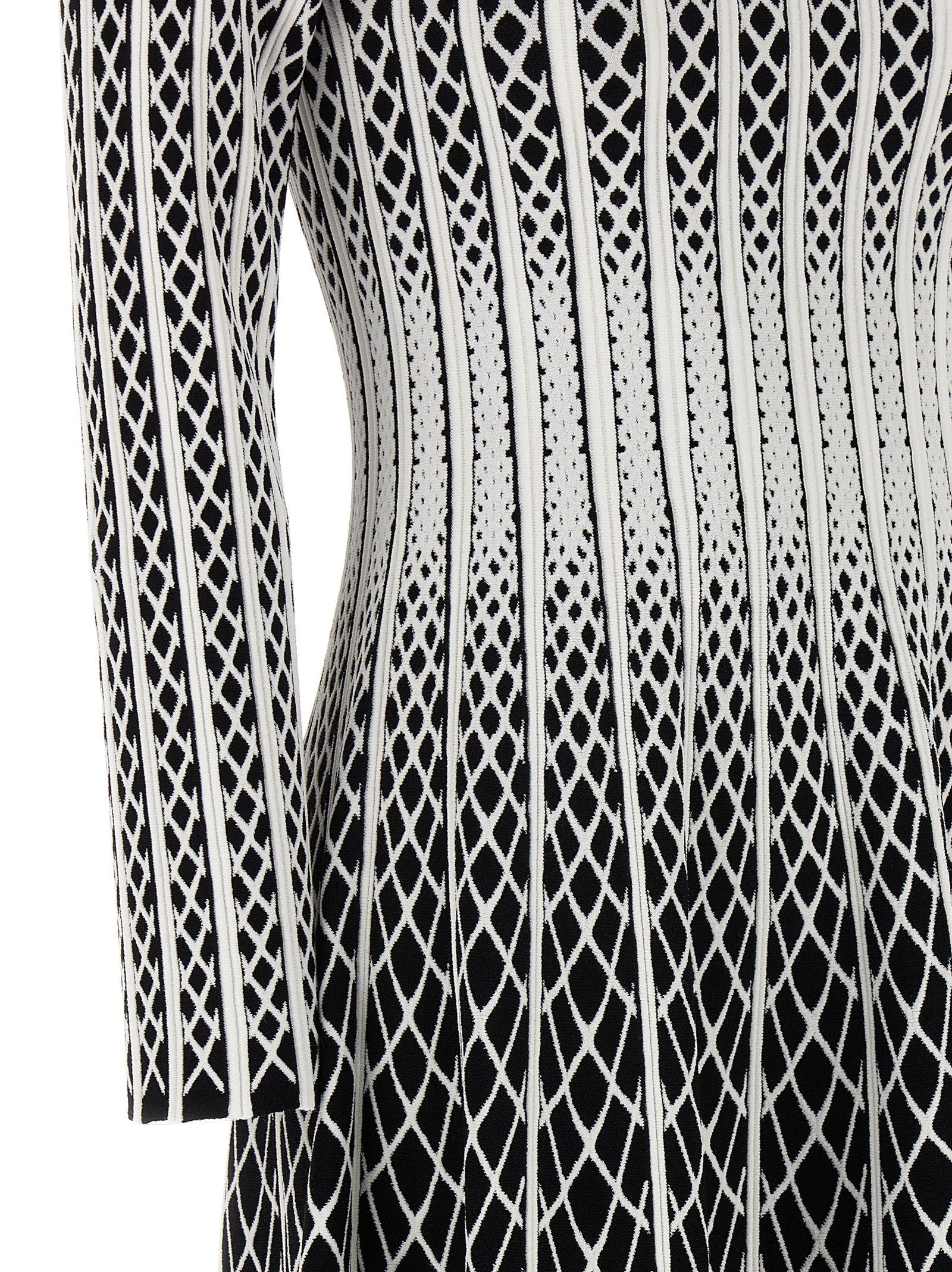 Skirt by ANTONINO VALENTI for women in polyester & viscose bicolour, black, white & patterned features a captivating silhouette, showcasing the captivating Women's Polyester & Viscose Midi Skirt design with a sophisticated midi for a captivating look.