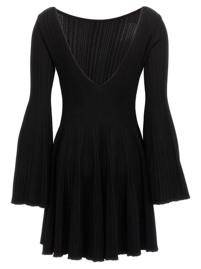 Skirt by ANTONINO VALENTI for women in stretch polyamide viscose black showcases a dramatic silhouette, artfully capturing the essence of the Women's Stretch Polyamide Viscose Mini Skirt in a dramatic mini cut for a refined look.