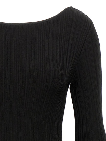 Skirt by ANTONINO VALENTI for women in stretch polyamide viscose black showcases a sultry silhouette, elegantly defined by its mini and the sophisticated sultry design of the Women's Stretch Polyamide Viscose Mini Skirt.