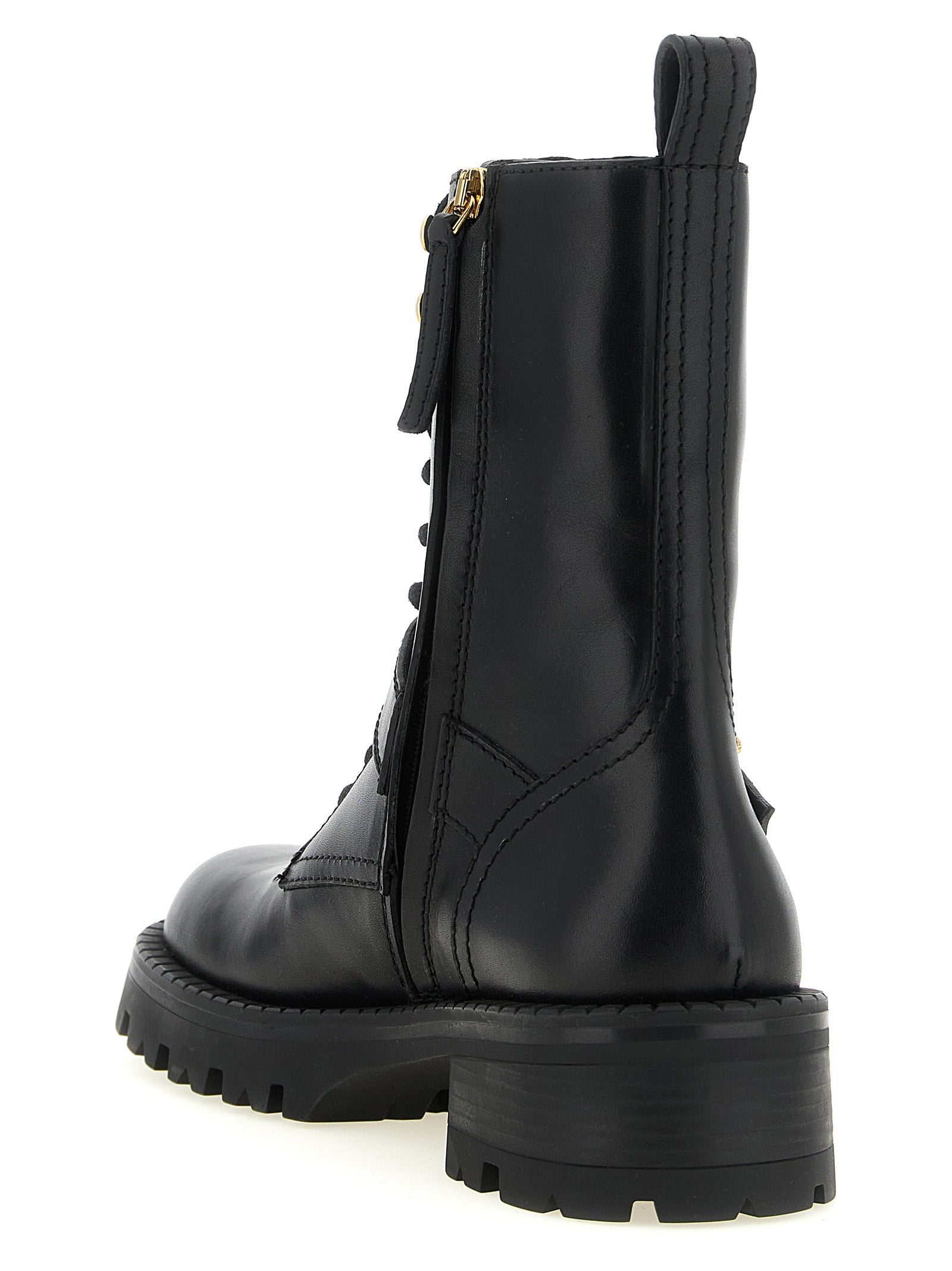 Lace-Up Ankle Boots by Versace for women in calfskin leather black & gold features an dynamic silhouette, showcasing the dynamic Medusa Women's Calfskin Leather Lace-Up Ankle Boots design with its distinctive and elegant .