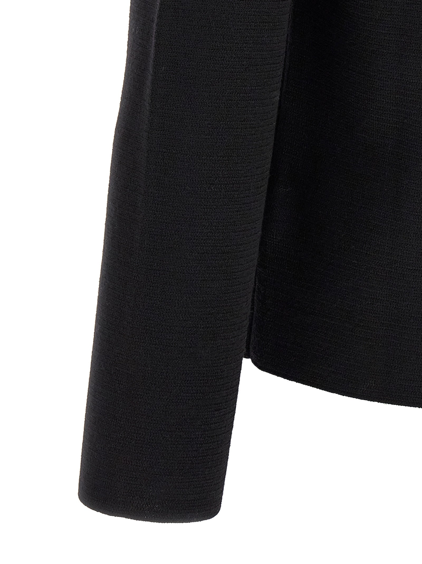 Cardigan by ZANONE for men in virgin wool black showcases a luxurious silhouette, meticulously detailed with a sophisticated and for a refined finish.