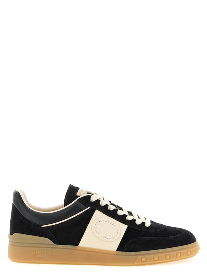 Sneakers by Valentino Garavani for men in bos taurus suede calfskin leather black, cream, multicolor & signature presents a sumptuous silhouette, artfully capturing the essence of the Rockstud V Logo Men's Low Top Bos Taurus Suede Calfskin Leather Sneakers with its sumptuous low-top style design.