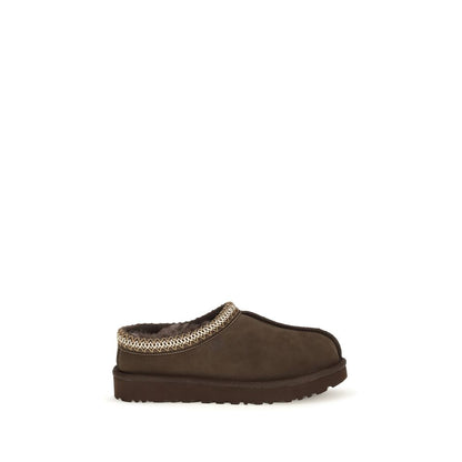 Mules Flat Shoes by UGG for women in eva polyester suede leather brown & signature features an statuesque silhouette from the Women's EVA Polyester Suede Leather Mules Flat Shoes collection, showcasing a and a statuesque for a statuesque look.