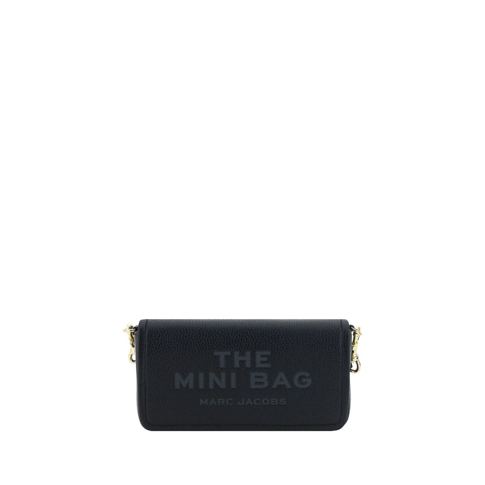 Mini Shoulder Flap Bag by Marc Jacobs for women in bos taurus calf grained leather black & monogram features a distinguished silhouette, showcasing a secure flap, magnetic & button and distinguished single-compartment with versatile shoulder-strap & adjustable-strap for a distinguished finish.