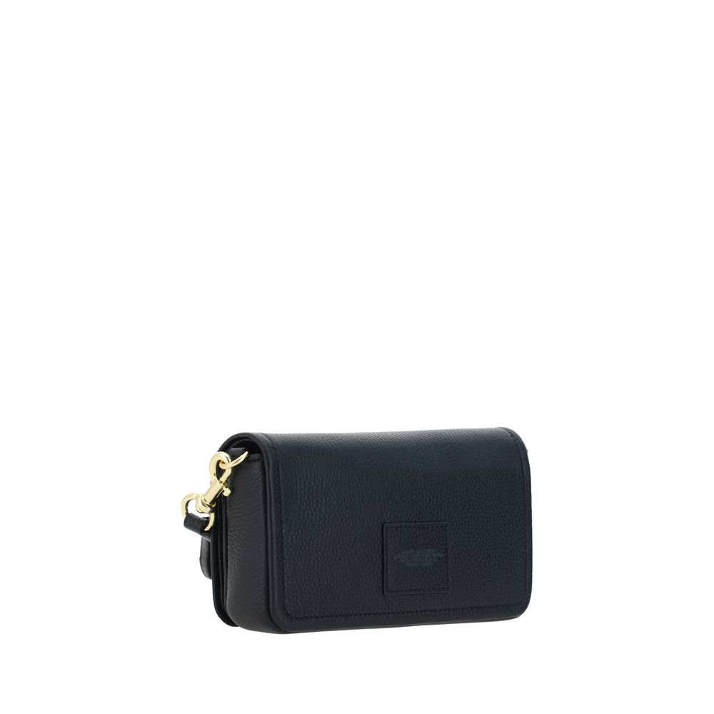 Mini Shoulder Flap Bag by Marc Jacobs for women in bos taurus calf grained leather black & monogram showcases a enviable silhouette, artfully detailed with a secure flap, magnetic & button, organized single-compartment, and versatile shoulder-strap & adjustable-strap for a enviable look.