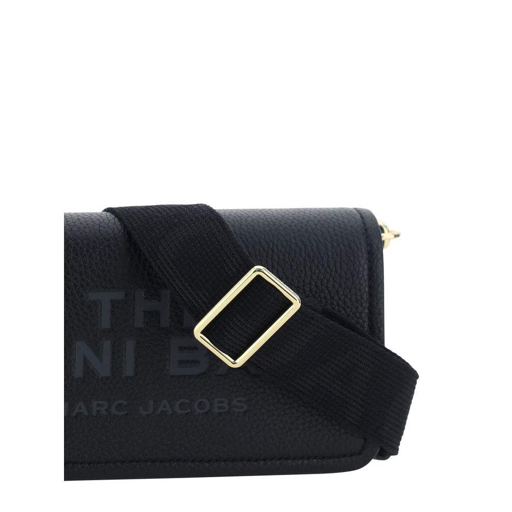 Mini Shoulder Flap Bag by Marc Jacobs for women in bos taurus calf grained leather black & monogram features a effortless sophistication silhouette, secured by a flap, magnetic & button with ample single-compartment and versatile shoulder-strap & adjustable-strap for a effortless sophistication finish.