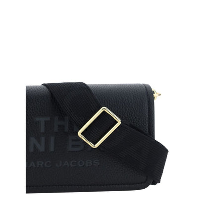 Mini Shoulder Flap Bag by Marc Jacobs for women in bos taurus calf grained leather black & monogram features a effortless sophistication silhouette, secured by a flap, magnetic & button with ample single-compartment and versatile shoulder-strap & adjustable-strap for a effortless sophistication finish.