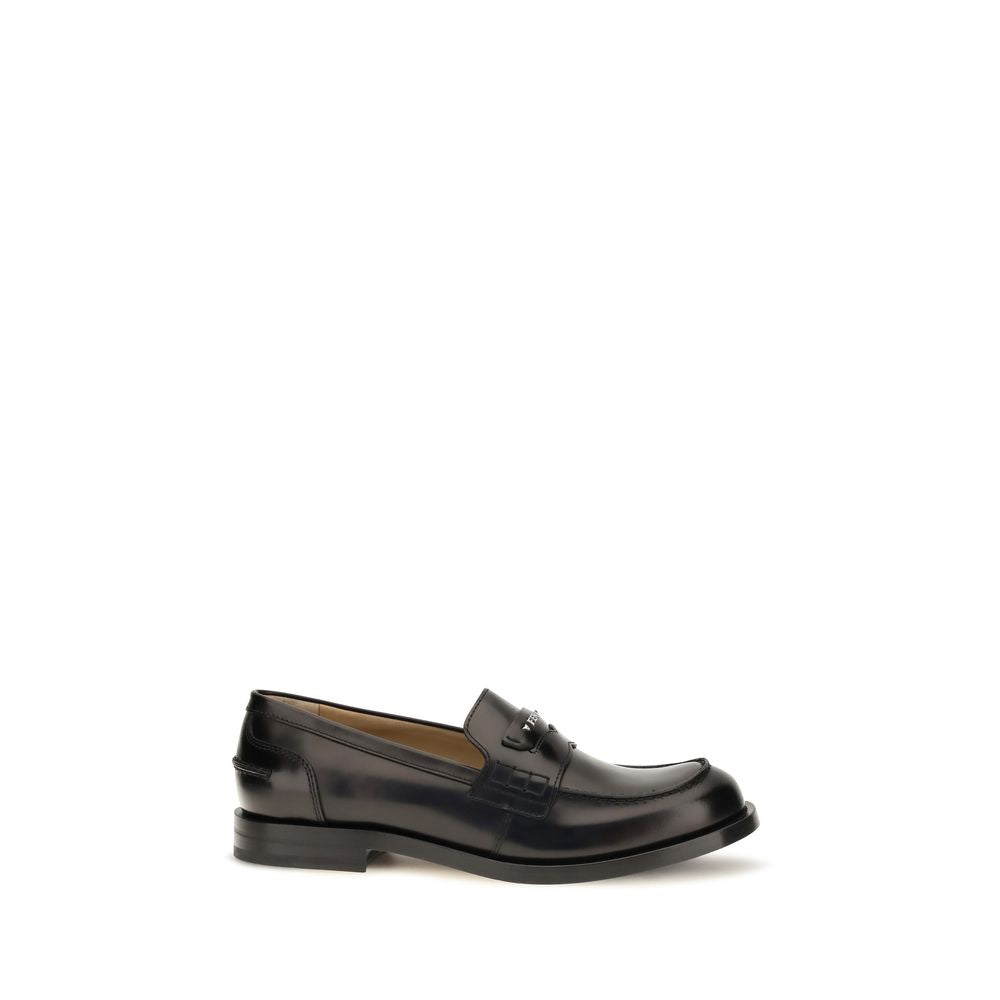 Loafer Slip-On Strap Shoes by Fendi for men in bos taurus calfskin leather & palladium black & palladium showcases a impeccable silhouette as College Men's Bos Taurus Calfskin Leather & Palladium Loafer Slip-On Strap Shoes, artfully designed with a impeccable and refined for a impeccable finish.